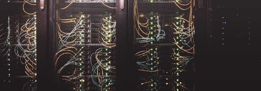 Server racks with locked cabinets to prevent physical tampering